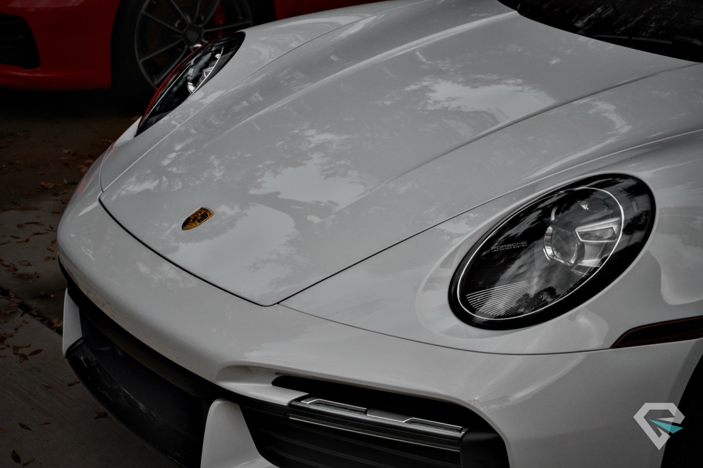 Porsche 911 hood detail showing ceramic coating gloss